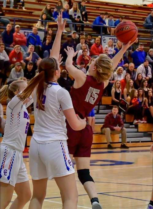 Olivia Waufle takes on two defenders in the post