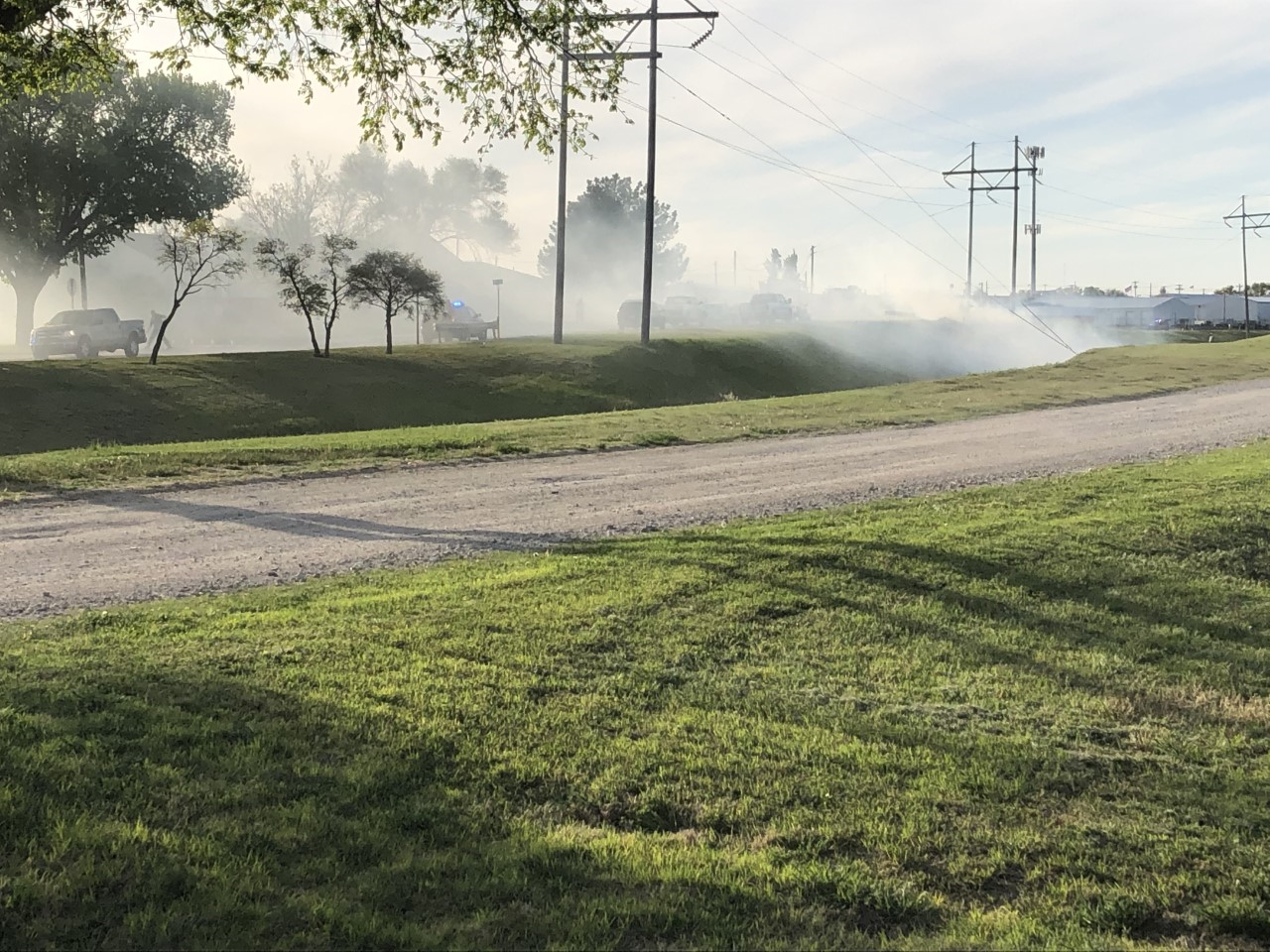 Hays firefighters contain a grass fire in the Chetolah Creek draw early Tuesday evening.