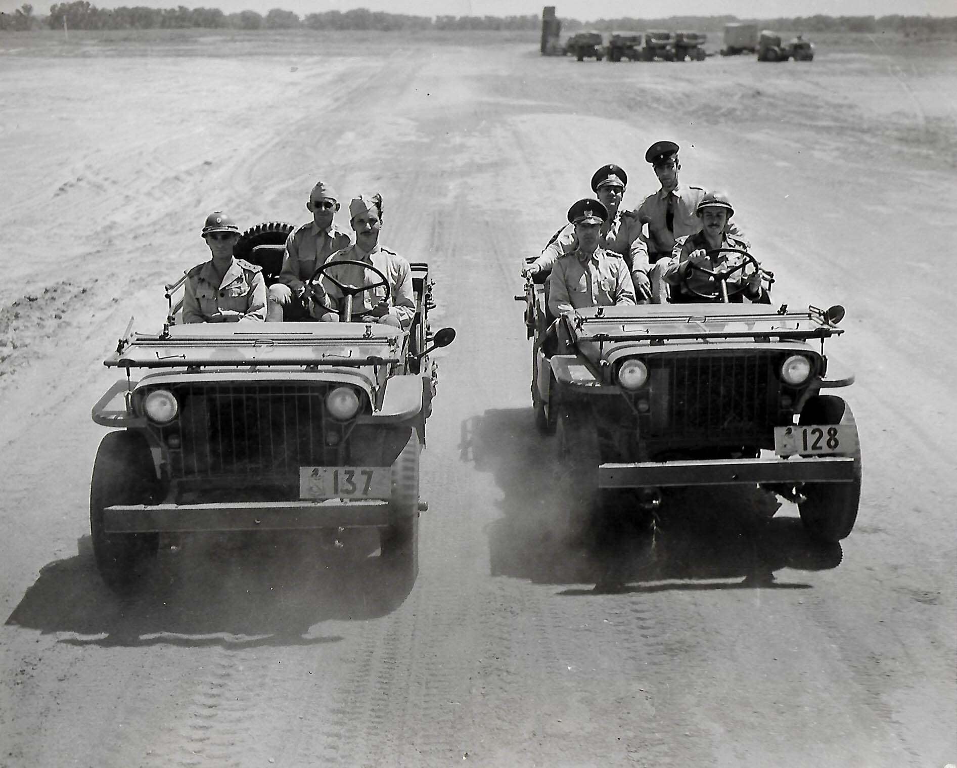 U.S. Allies from all over the world came to Fort Riley to train.&nbsp; From left to right in the two jeeps are Capt. Gilberto Pessanha, of Brazil; Capt. Rene I. Chipi y Cordova, of Cuba; Lt. Guillermo Fuentes, Castellnos ( driving ) of El Salvador; Capt. Enrique Ortiz Vega, of Chile; Capt. Alberto Enchaurren Gaeta, of Chili; Lt. Reinaldo Varea Donoso of Educador; and Lt. Jose Fragomeni of Brazil. Officials U.S. Army photo provided by @Fort Riley Museums.