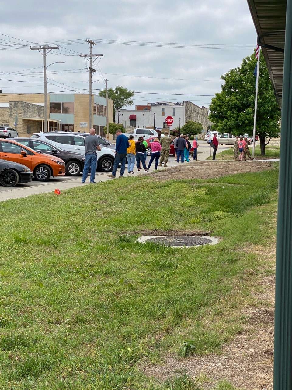 Members of the public wait to access the Geary County Office Building