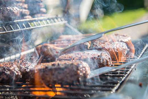 Hamburgers on the grill photo courtesy KSRE