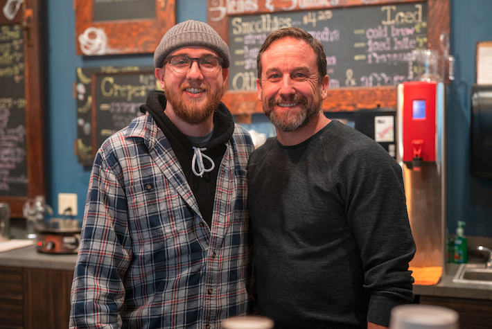 <i>Andrew McGinnis and his dad, Patrick McGinnis, both earned bachelor degrees from Fort Hays State University this spring.</i>