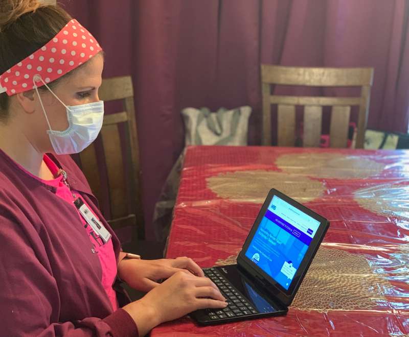 <b>Emalee Jorgenson, RN, works on a telehealth appointment.</b> Photo courtesy OCCK