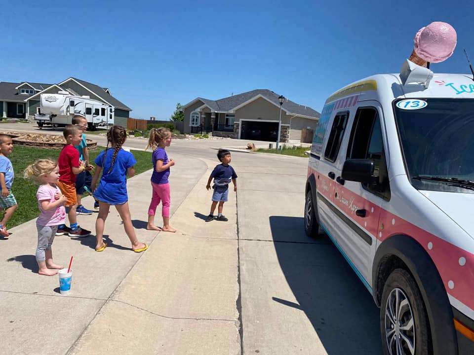 Children gather around Mijom Ice Cream Xpress. Courtesy photo