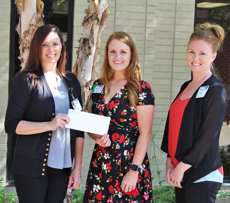 <i><b>From left are Sara Boyd, EOC committee member; Jandi Wells, Abilene Girl Scout troop leader; and Haley Jones, EOC committee member.</b> Photo courtesy MHS</i>