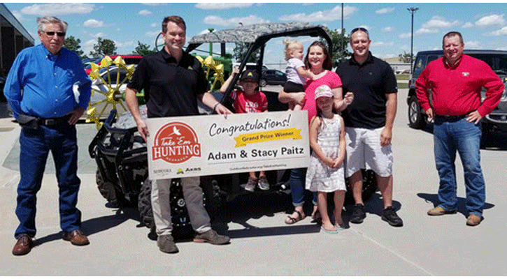From left, Stacy, Harper, Avery, James and Adam Paitz, the grand prize winner of the Nebraska Game and Parks Commission Take 'em Hunting challenge pose in their new UTV donated by AKRS Equipment on June 10, 2020, in Grand Island, Nebraska.  