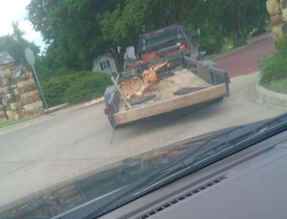 <b>The stolen iron furniture on the flatbed trailer.</b> Photo courtesy Salina Police Department