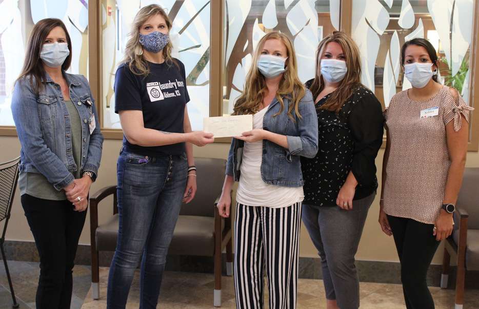 <i><b>The Jeans Day was organized by the MHS Employer of Choice (EOC) committee. Pictured from left are: Sara Boyd, EOC committee member; Holly Walker, Laundry Love of Abilene director; Haley Jones, EOC committee member; Cindy Whittington, EOC committee member; and Ashley Hernandez, EOC committee member.&nbsp;</b> Photo courtesy MHS</i>
