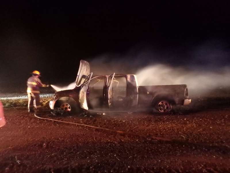 <b>A firefighter with Rural Fire District No. 3 extinguishes the pickup fire.</b> Photos courtesy Saline County Sheriff's Office
