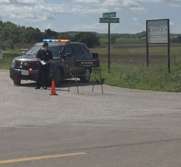 Authorities near the scene of July 22 investigation -photo courtesy WIBW TV