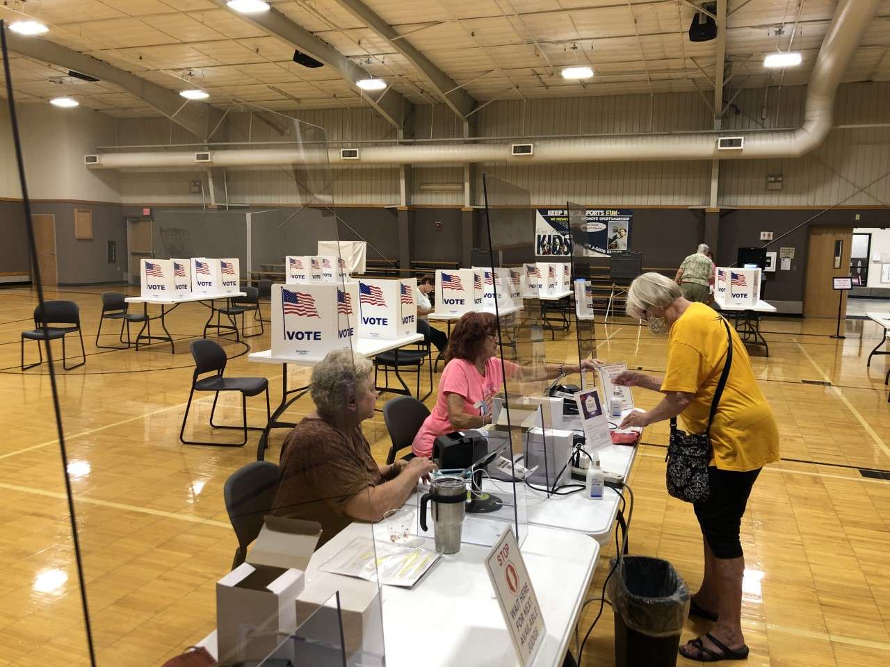 Ellis County poll workers are protected by Plexiglass