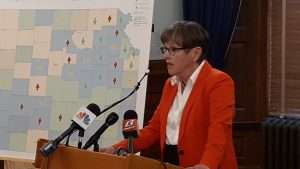 <b>Gov. Laura Kelly says passage by Missouri voters of Medicaid expansion leaves Kansas in a five-state group with Colorado, Nebraska and Oklahoma still resisting a federal program extending health care to low- and moderate-income people.</b> Photo by Tim Carpenter courtesy Kansas Reflector