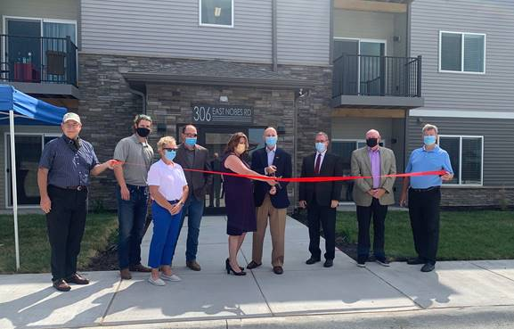 <b><i>Gov. Ricketts prepares to cut ribbon on the Creekside Apartments in York alongside&nbsp;</i></b><b><i>leaders who helped make the project possible.</i></b>