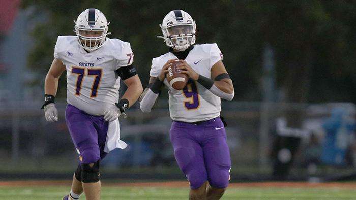 <b>Junior quarterback Isaiah Randalle led the Coyotes to a victory over the Bethany Swedes.</b> Photo courtesy <a href="http://kwucoyotes.com">kwucoyotes.com</a>