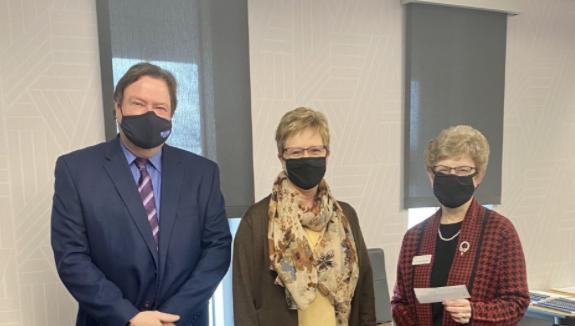 From left: NPPD Board Member Charlie Kennedy and NPPD District Account Manager Terry Rajewich, present WCCA Board of Governors Chair Lynne Klemke with a donation of $10,000 to fund student scholarships. The money is raised from the 29th annual Nebraska Open golf tournament in September.&nbsp;