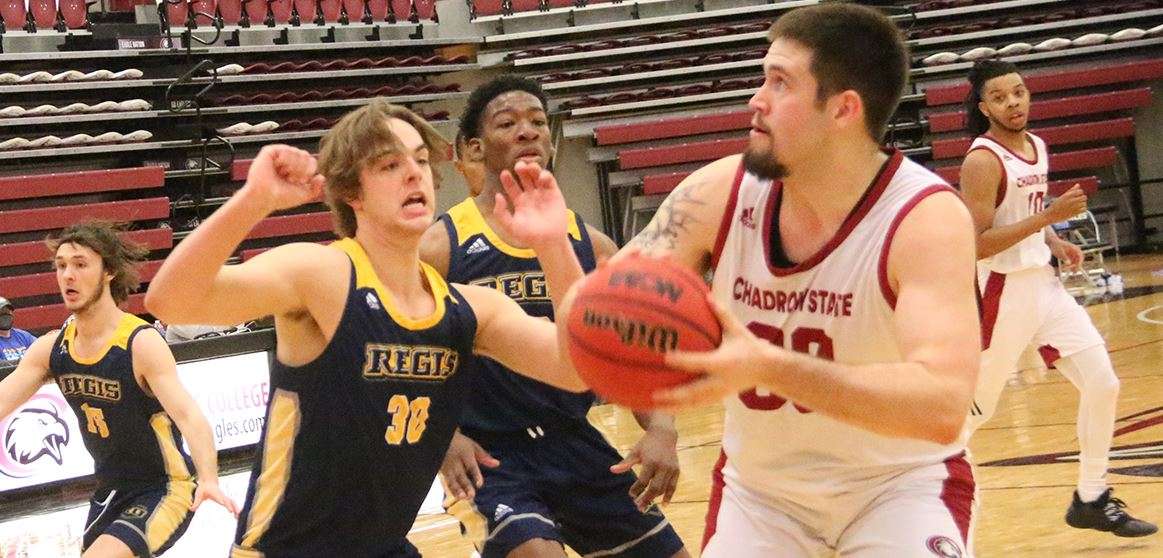 Jacob Jefferson seeks a shot against Regis Monday night - CSC Athletics