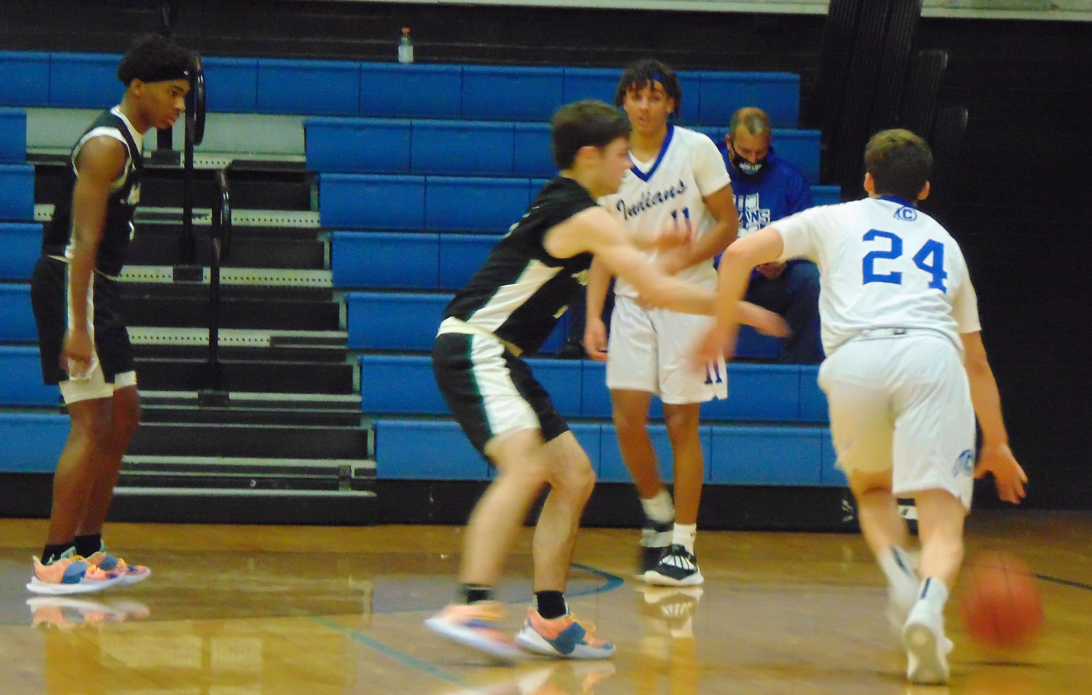 Trey Main dribbles in the second half of Tuesday's 60-56 win over Lafayette. Main finished with a game-high 22 points. Photo by Tommy Rezac.