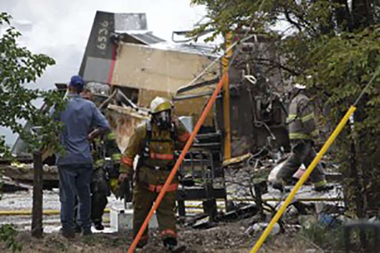 Bill Ring, who was the director of Ellis County Emergency Management at the time, responded to this train derailment and fire in July 2013 at Vine and Eighth streets in Hays. File photo