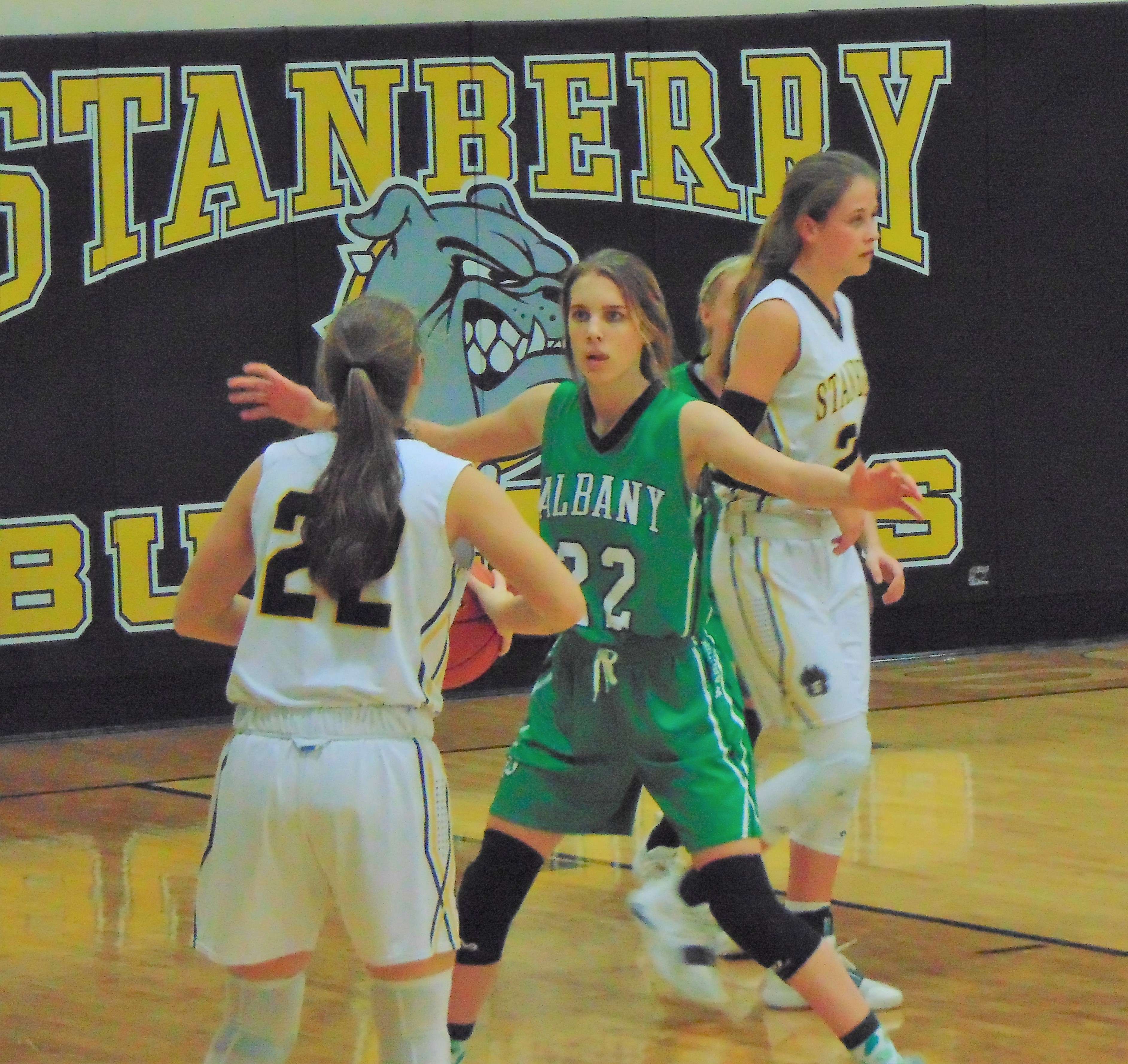 Albany's Abigail Troncin guards Stanberry's Tarynn Mattson. Stanberry defeated Albany in the semifinal game, 37-23. Photo by Tommy Rezac.