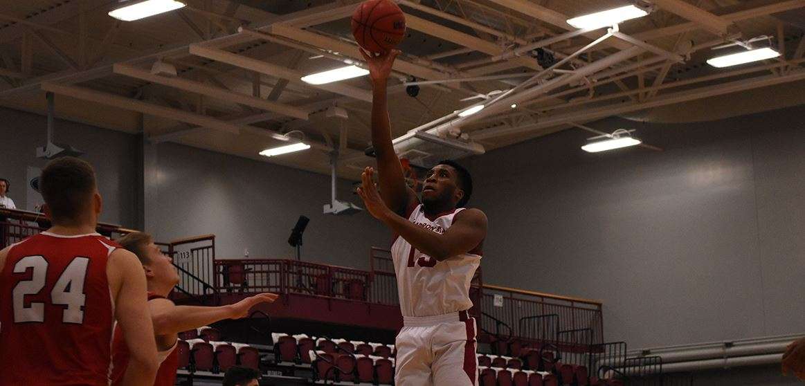 CSC's Psalm Maduakor takes a shot against Western Colorado