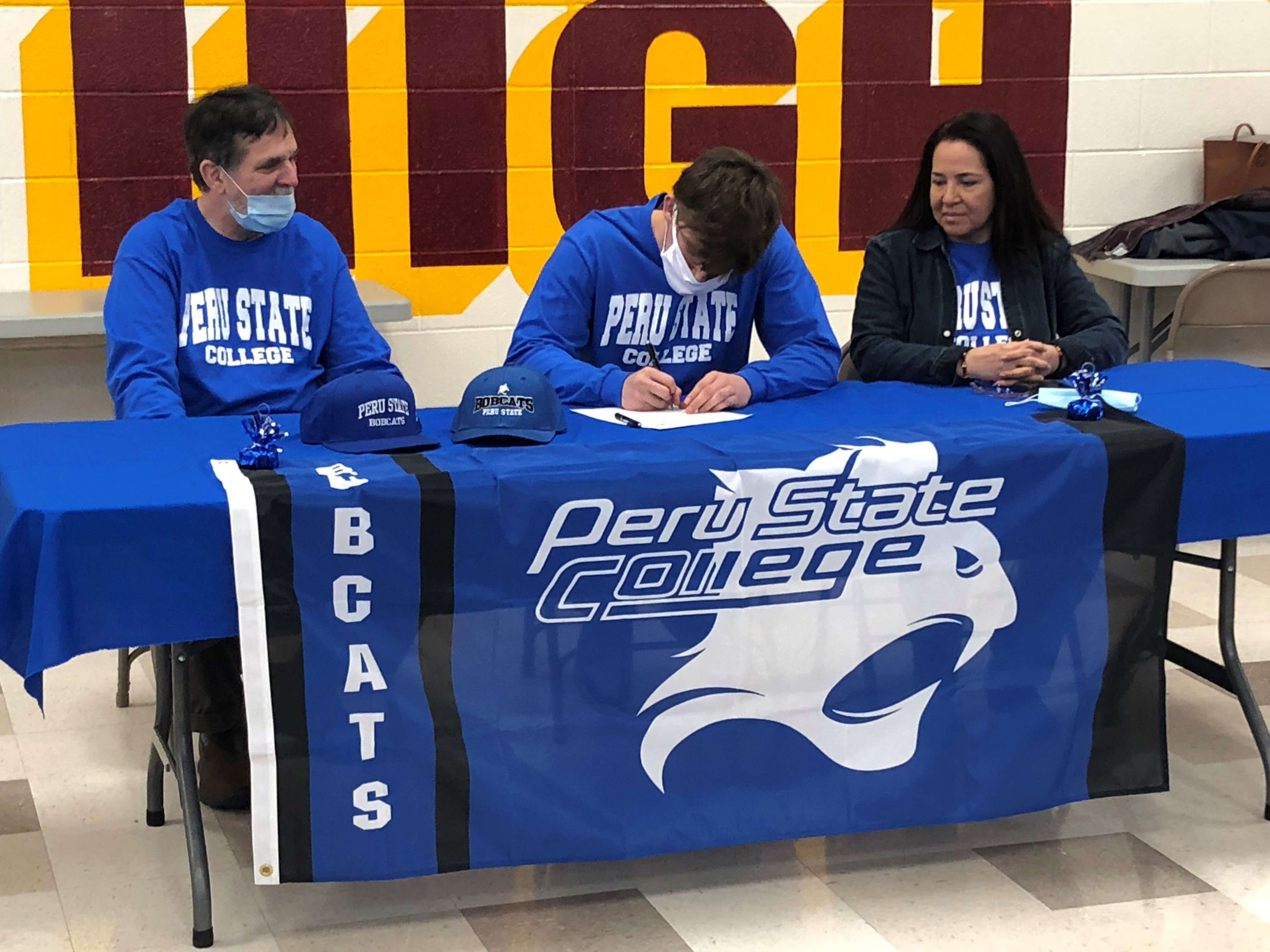 Hays High senior Bill Scott signed to play football at Peru State College Wednesday.