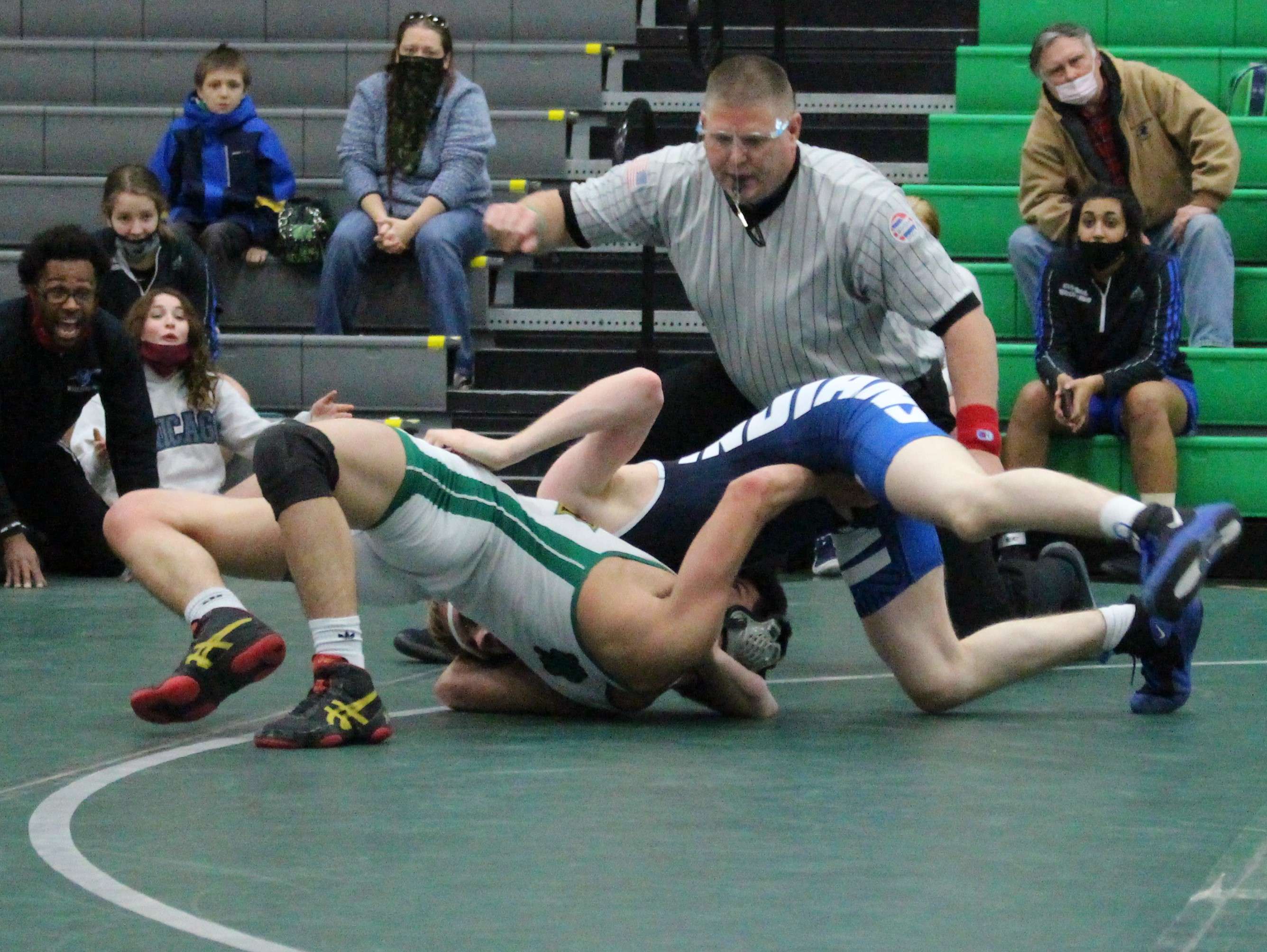 Lafayette's Marco Dalakishvili (126) earned a pin over Central's Logan Cook Thursday. Photo by Whitnee Ice.