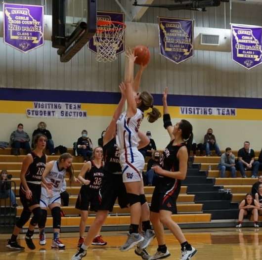 Platte Valley freshman Maggie Collins, who scored a game-high 15 points and was named the North Platte tournament MVP, goes up for two in the second half of Saturday's 41-25 win over North Andrew. Photo by Whitnee Ice.