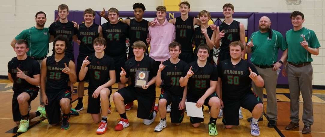 Mid-Buchanan boys' basketball takes a group picture after their 56-54 win over Mound City in Saturday's North Platte tournament championship. Photo by Whitnee Ice.