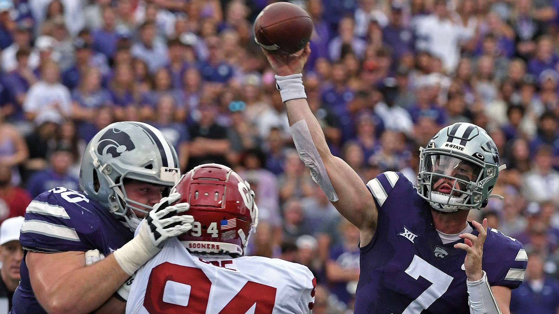K-State's Skyler Thompson attempts a pass against No. 6 Oklahoma Saturday (Courtesy Kansas State Athletics)