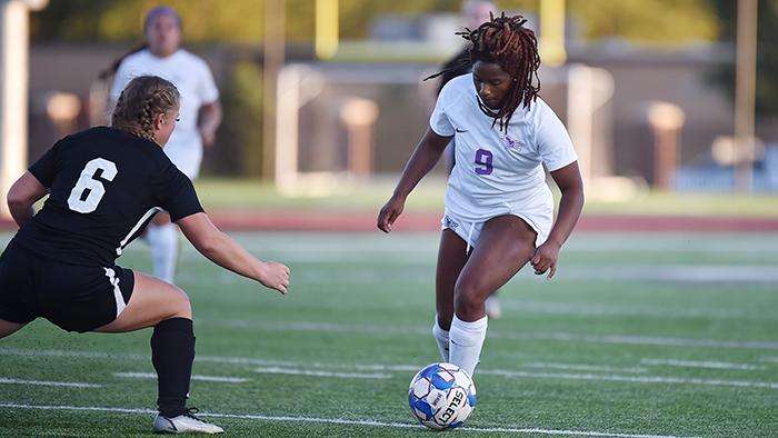 <b>Kayla Deaver, right. </b>Photo courtesy <a href="http://kwucoyotes.com">kwucoyotes.com</a>