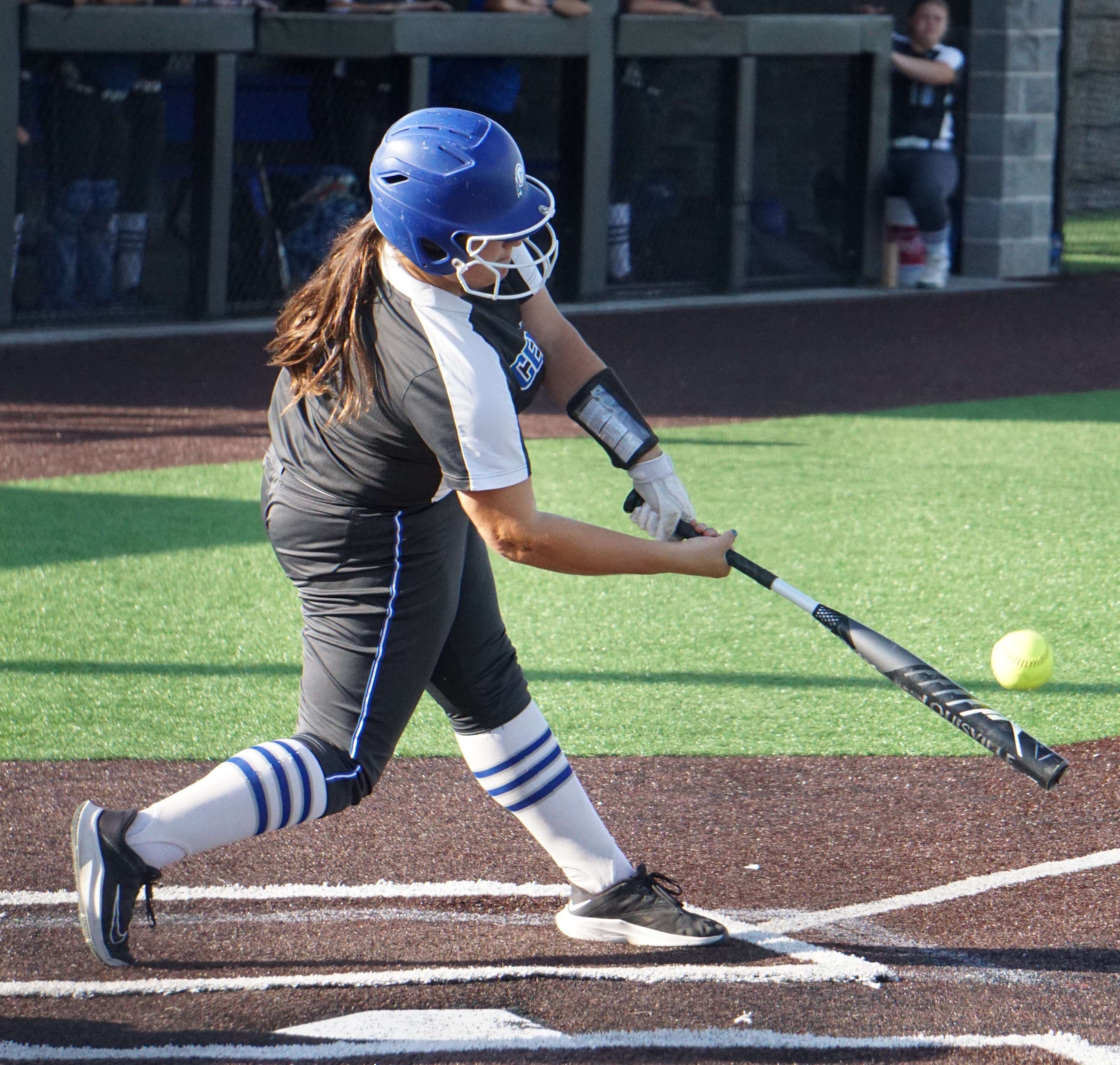 Brooke Gerling puts the bat on the ball in Thursday's district championship. Photo by Tommy Rezac.