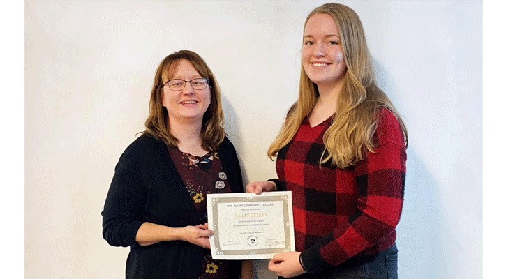 <i>Dr. Kathy Harrison, Mid-Plains Community College director of nursing, presents a certificate to Bailey Oetken for being the Nursing Student of the Month for October.</i>
