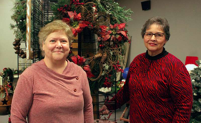 Volunteers Donna McKenzie and Joan Heier have created more than 200 items for the Arc's annual Festival of Trees. An online auction will be Friday through Nov. 17.<br>