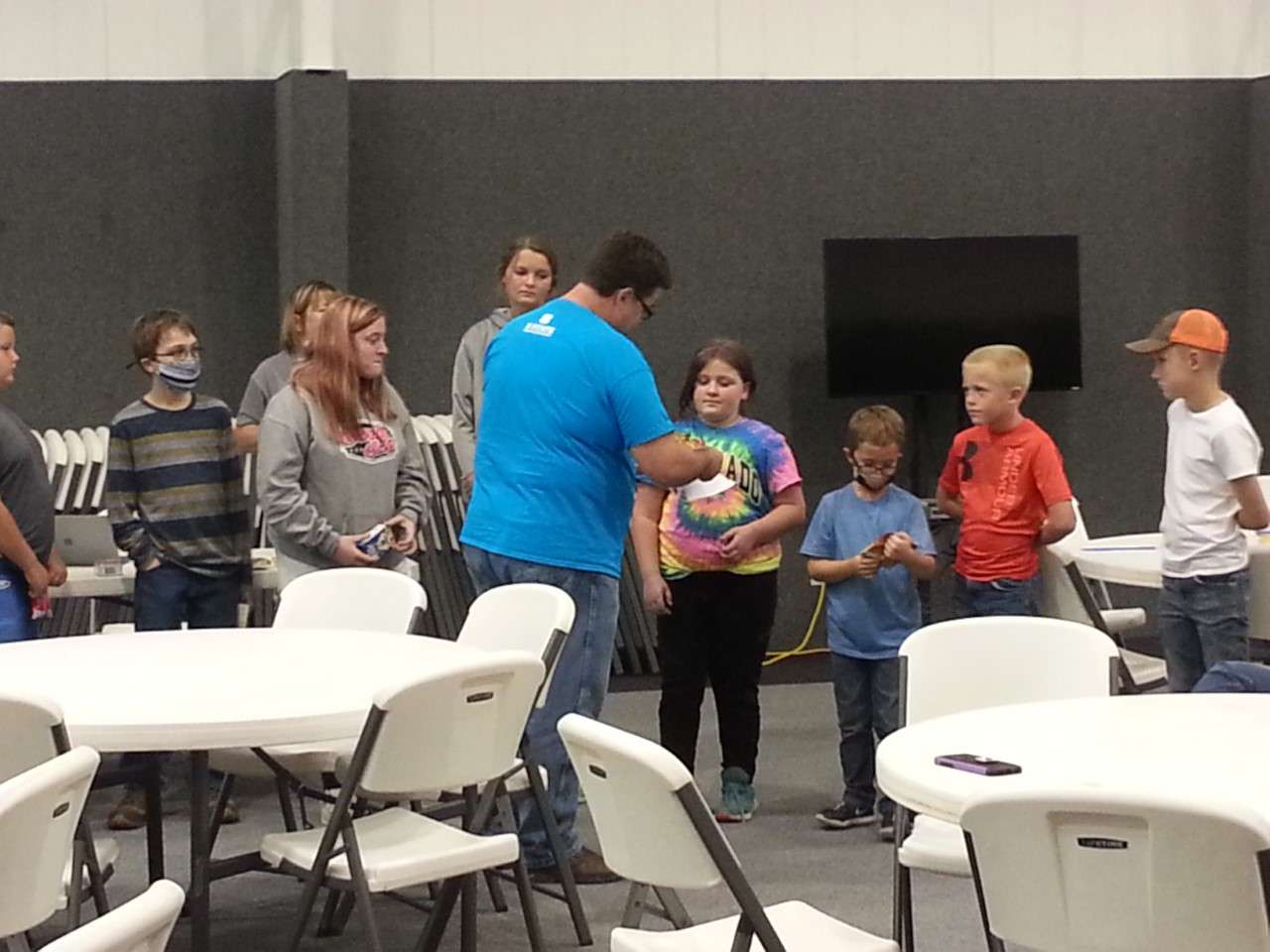 <b>Henry Littich gave out cereal to the club members while installing them in their officer positions on Oct.17. </b>Photo courtesy Smoky View 4-H Club