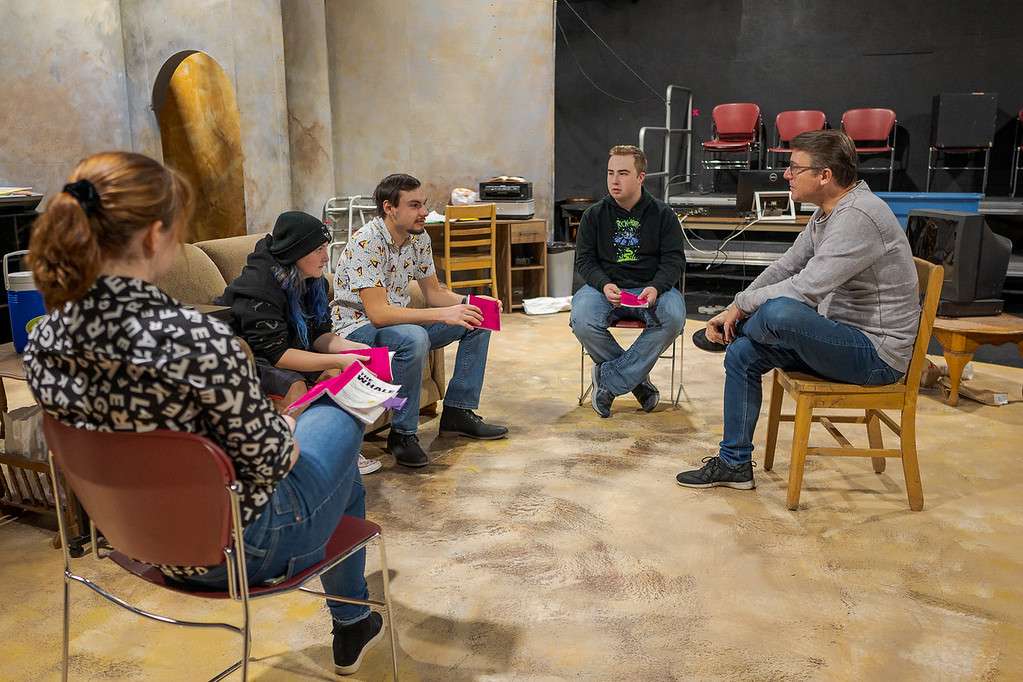 Interim Director of Theatrical Performances Michael Susko, right, speaks to actors, from left, Olivia Freeze, Trista Topil, Zak Wellnitz, and Brennan Ackerman during rehearsal for "The Whale" Nov. 4, 2021. (Photo by Daniel Binkard/Chadron State College)