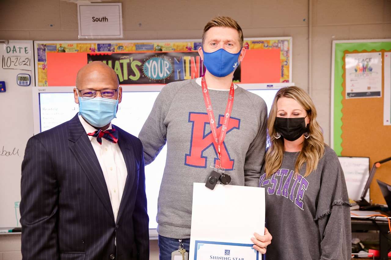 ( L- R ) Dr. Reginald Eggleston, Jacob McCallister, Westwood Elementary School Principal Kimberly Dressman.