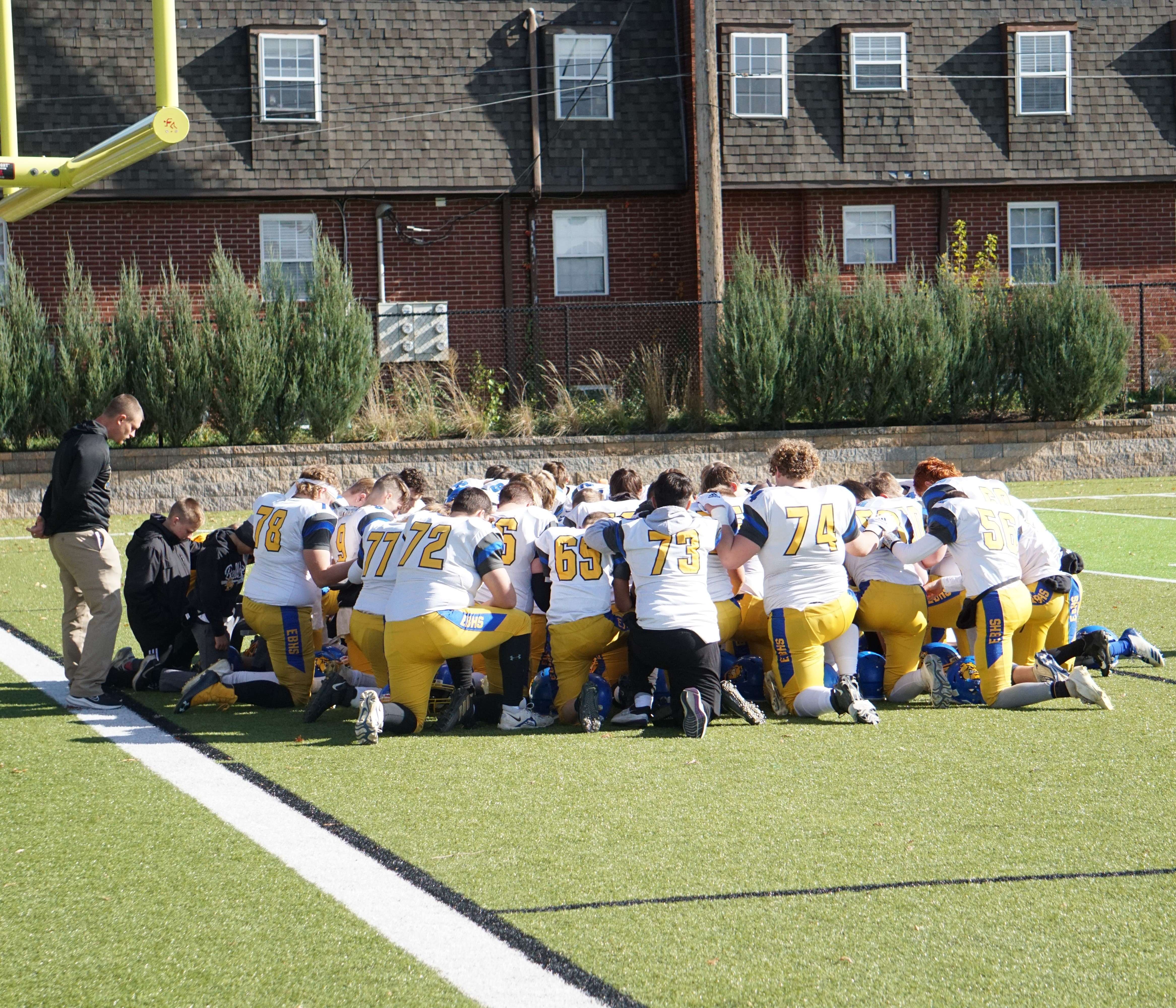 East Buchanan huddles at halftime. Photo by Matt Pike.