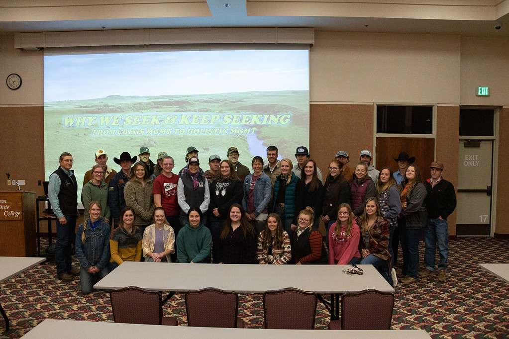 Tara and Josh Dukart of Seek First Ranch near Hazen, N.D., center, pose with Chadron State College range management students and Dr. Ron Bolze, left, in the Student Center during an intermission in the Dukarts' presentation Nov. 11, 2021. (Photo by Tena L. Cook/Chadron State College)