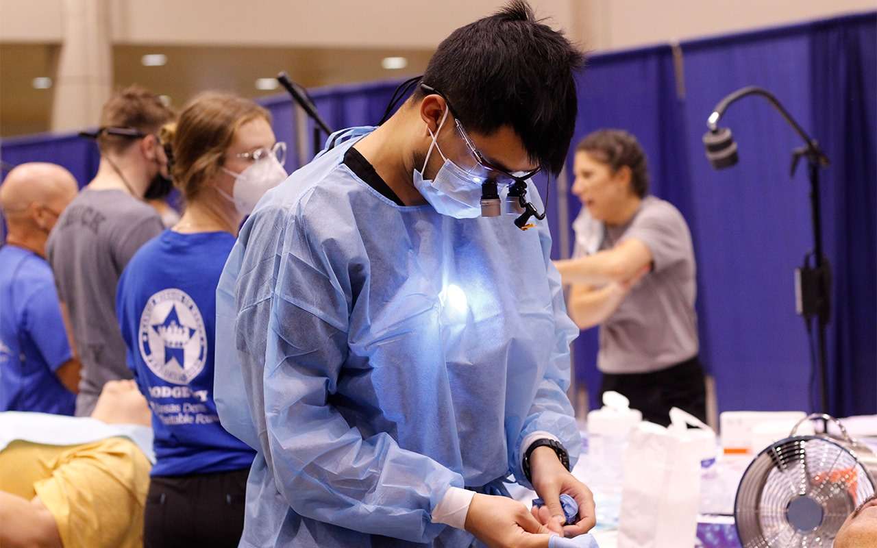 A dentist working at a previous Kansas Mission of Mercy event. Courtesy photo<br>