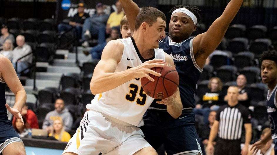 FHSU's Jackson Miller drives against Manhattan Christian Sunday at Gross Colisium (Courtesy FHSU Athletics, Niocole Heitmann)