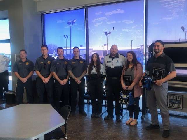 Members of the EMS team that responded to Midwest Superstore to render aid&nbsp; were on-hand for the ceremony.