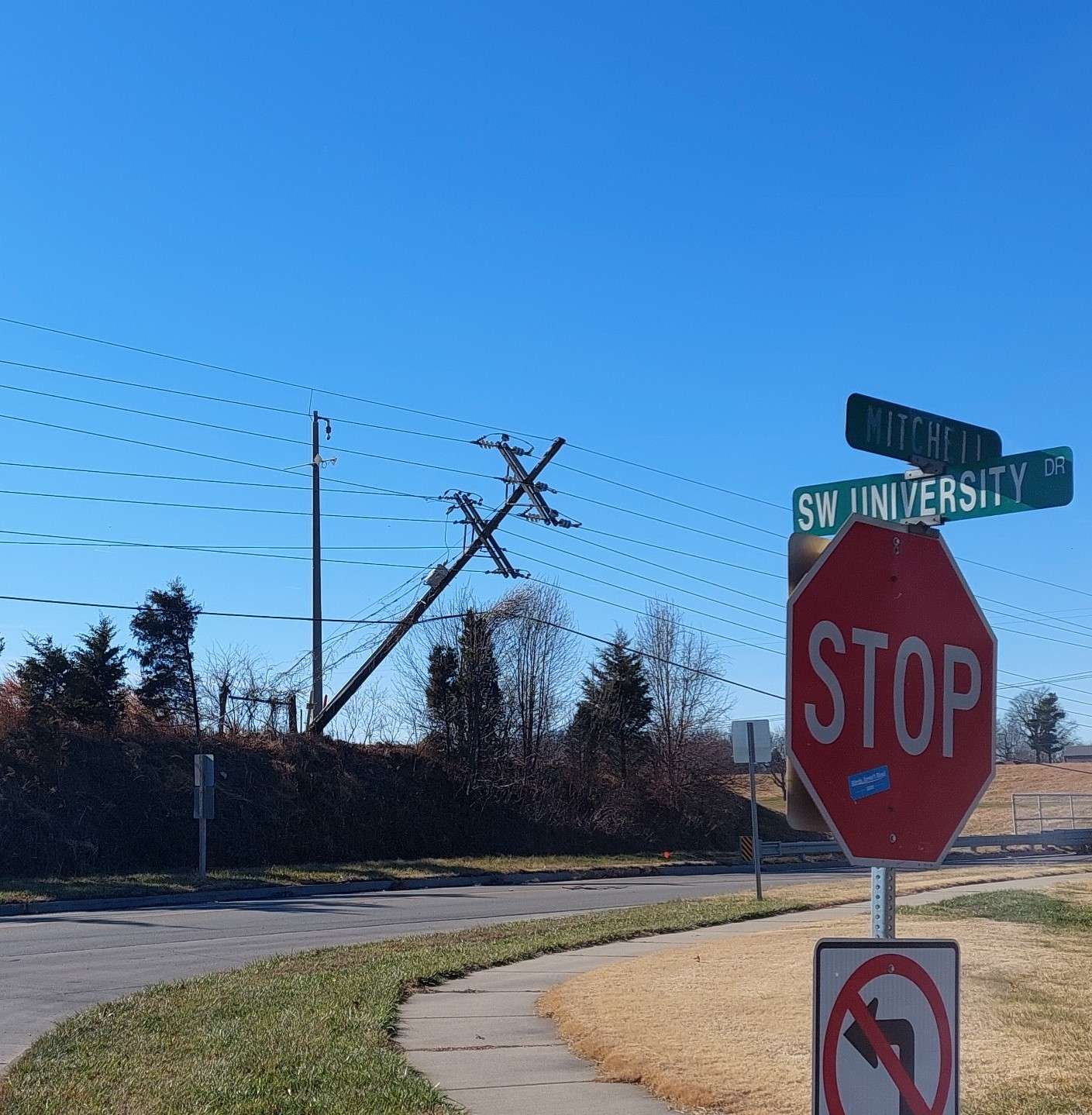 Utility pole damaged from Wednesday storms/Photo by Matt Pike