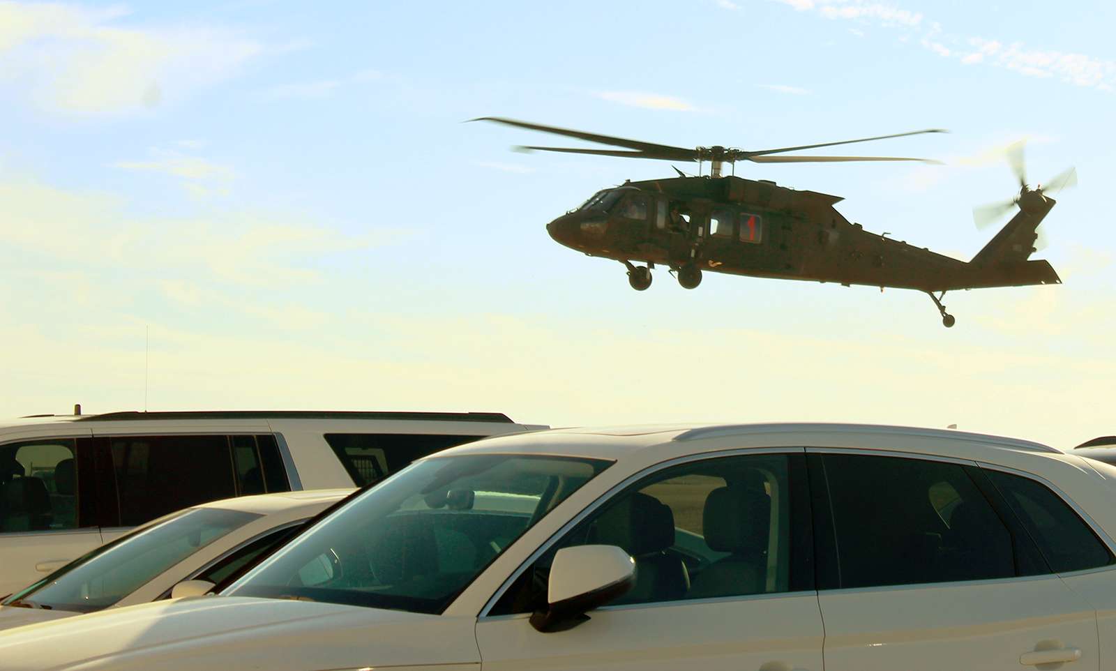 A Blackhawk helicopter takes off from the Hays Regional Airport. The Blackhawks were dumping water on fire hot spots on Friday.<br>