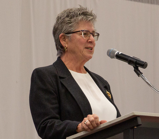 Chadron State College Grounds Supervisor Lucinda Mays addresses graduates in the Chicoine Center Dec. 17, 2021. (Photo by Tena L. Cook/Chadron State College)