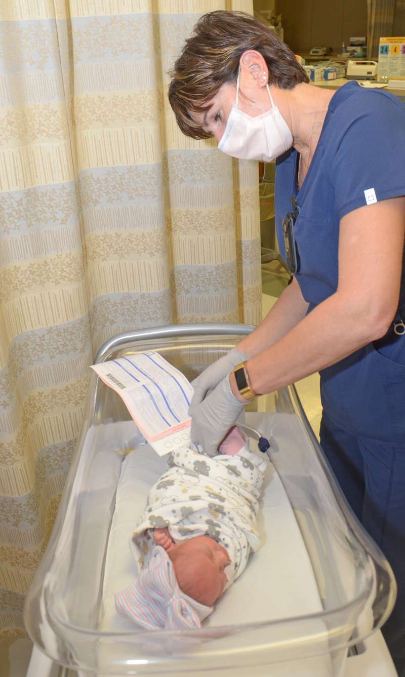 <b>Sanja Hower, RN, for Salina Regional Health Center’s Birth Center, conducts a newborn screening on Wednesday.</b> Photos courtesy Salina Regional Health Center