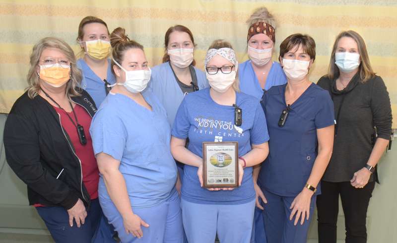 <b>Salina Regional Health Center Birth Center staff members received a plaque for being named one of Kansas’ Best of the Best in Metabolic and Newborn Screening for a second year in a row.</b>