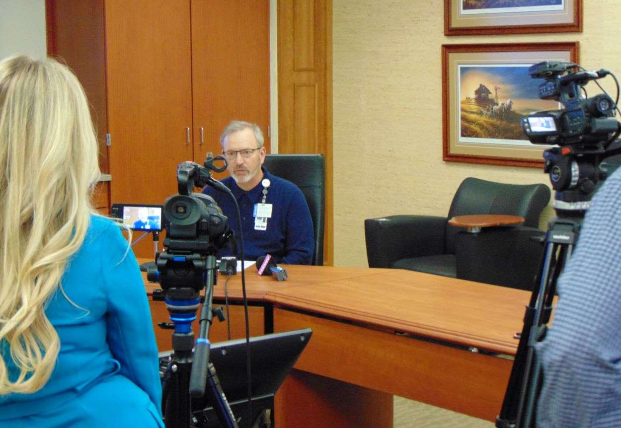 Dr. Davin Turner addresses the news media during a COVID-19 briefing/file photo