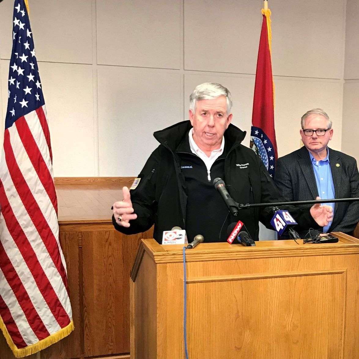 Sen. Dan Hegeman looks on as Missouri Gov. Mike Parson speaks during a stop in St. Joseph/file photo