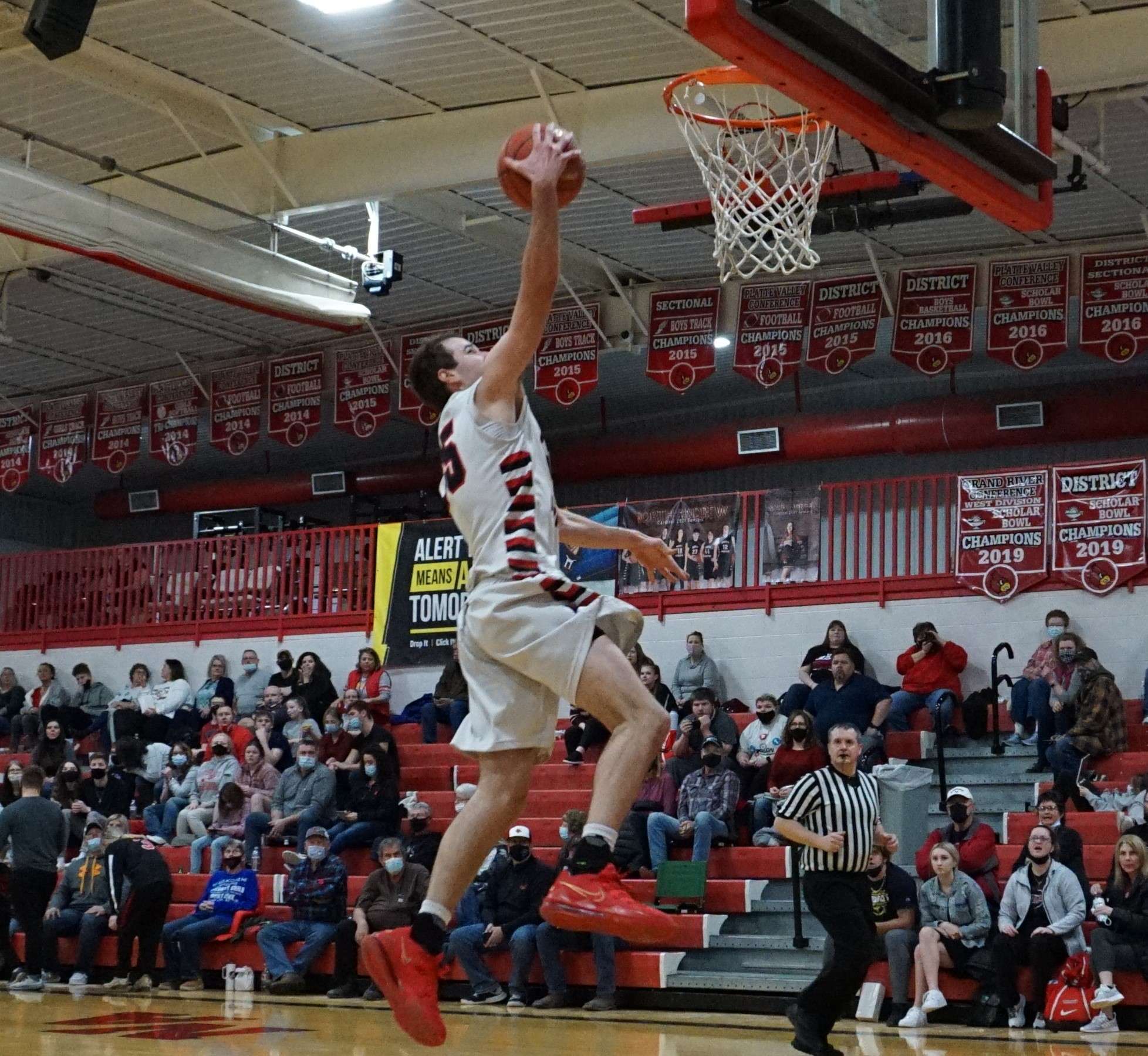 North Andrew's Tanner McDaniel goes up for two in the Cardinals' 76-46 win over St. Joseph Christian on Tuesday night. Photo by Whitnee Ice.