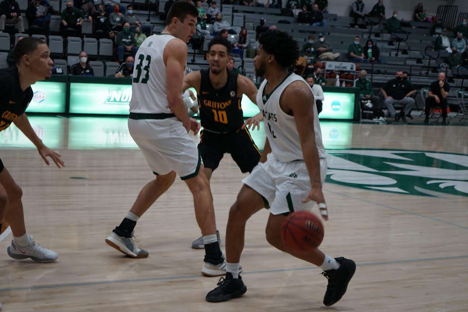 Northwest Missouri State's Isaiah Jackson brings the ball up the floor in Saturday's 70-64 win over Missouri Western. Photo by Whitnee Ice.